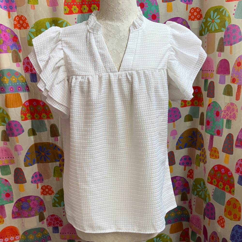 Niay Ruffle Short Sleeve Blouse. Large